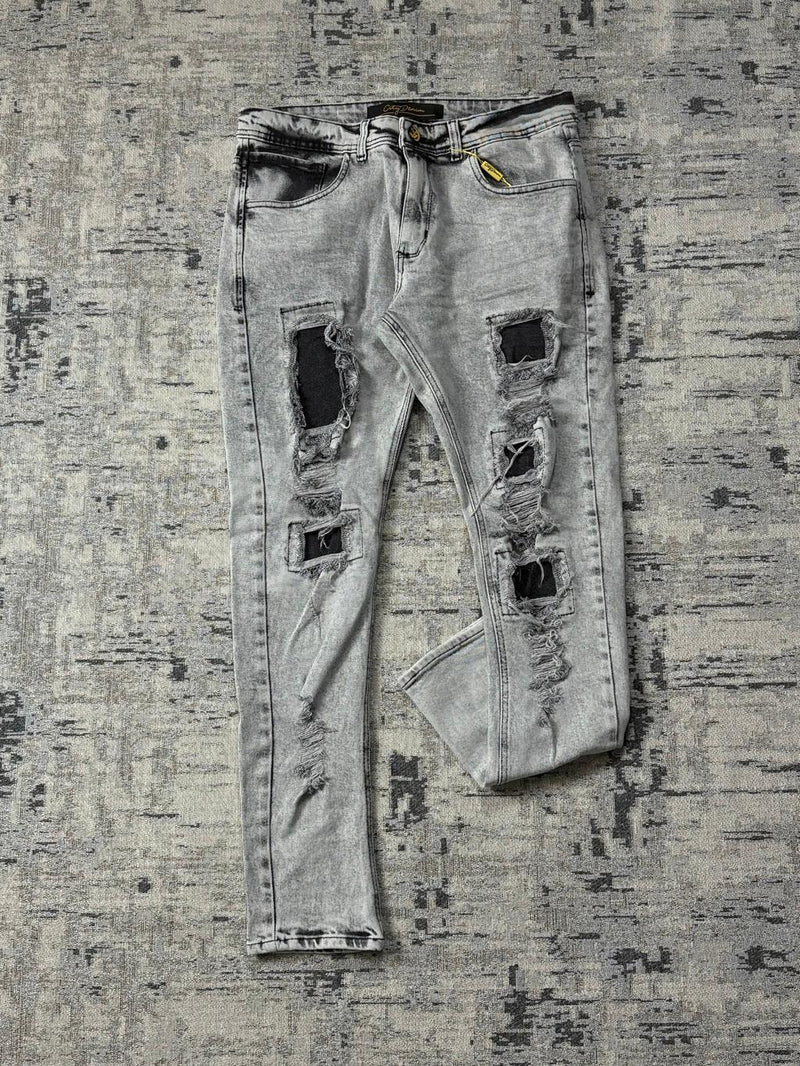 Calça Jeans Jogador Clara com Rasgos